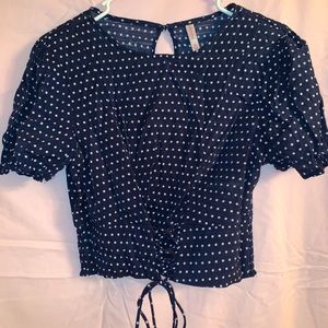 Navy blue and white polka dot blouse